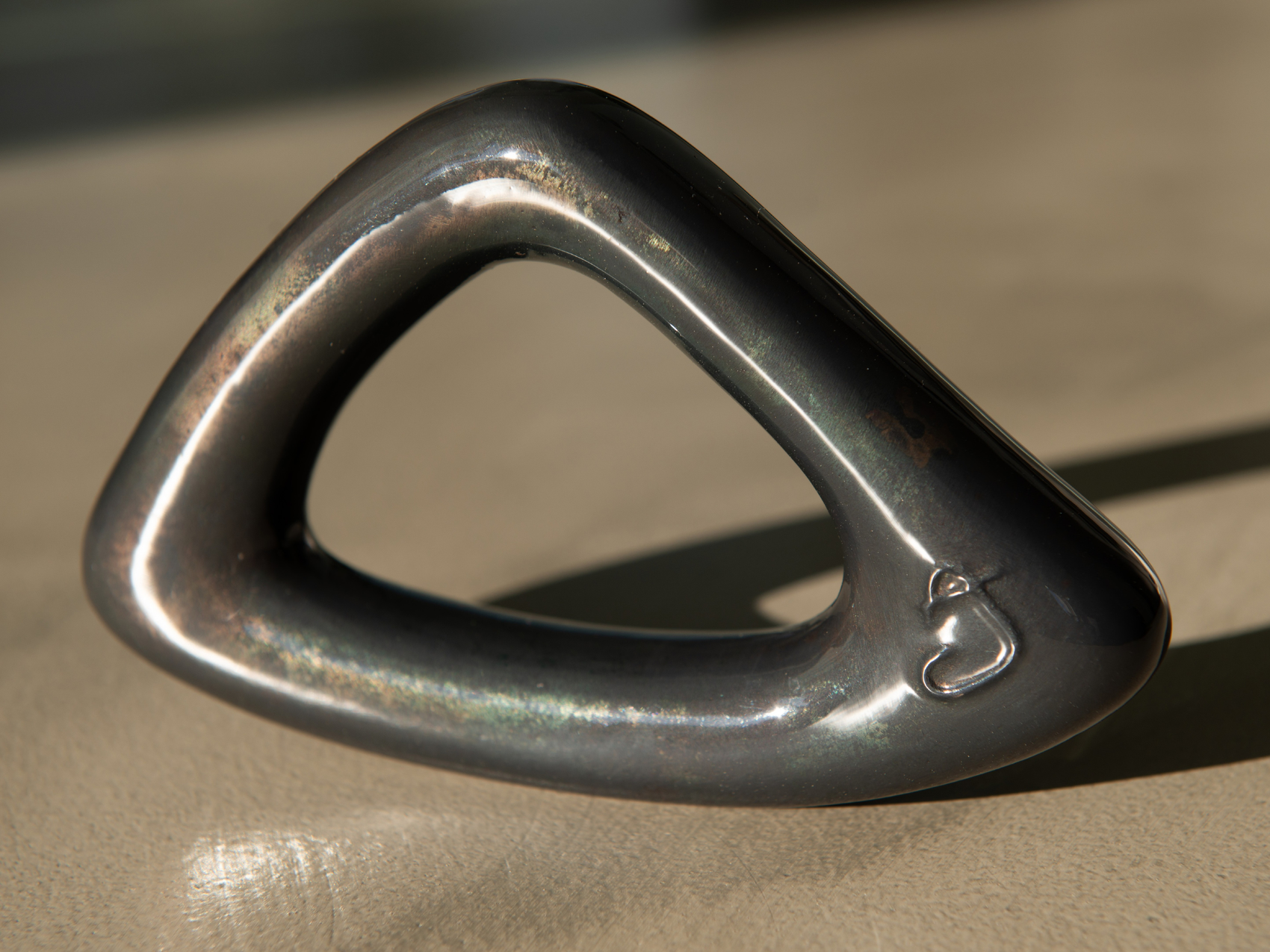 atomya logo on glazed anthracite steel dumbbell